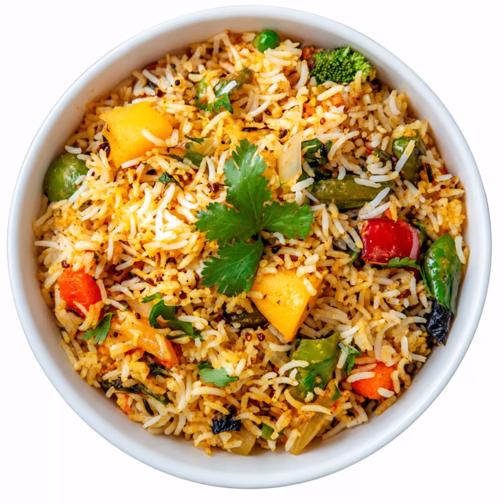 Vegetable pulao with fluffy basmati rice, peas, green beans, broccoli, peppers, potatoes, and fresh cilantro served in a white bowl.